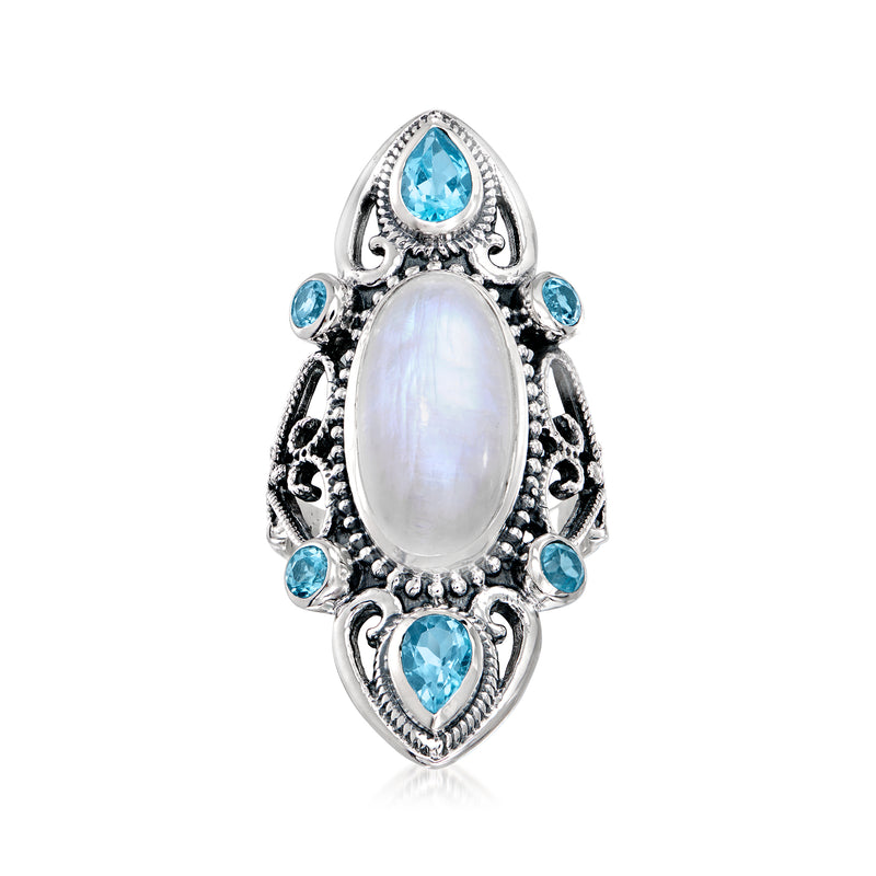 Sterling silver ring with oval moonstone center and Swiss Blue topaz side stones