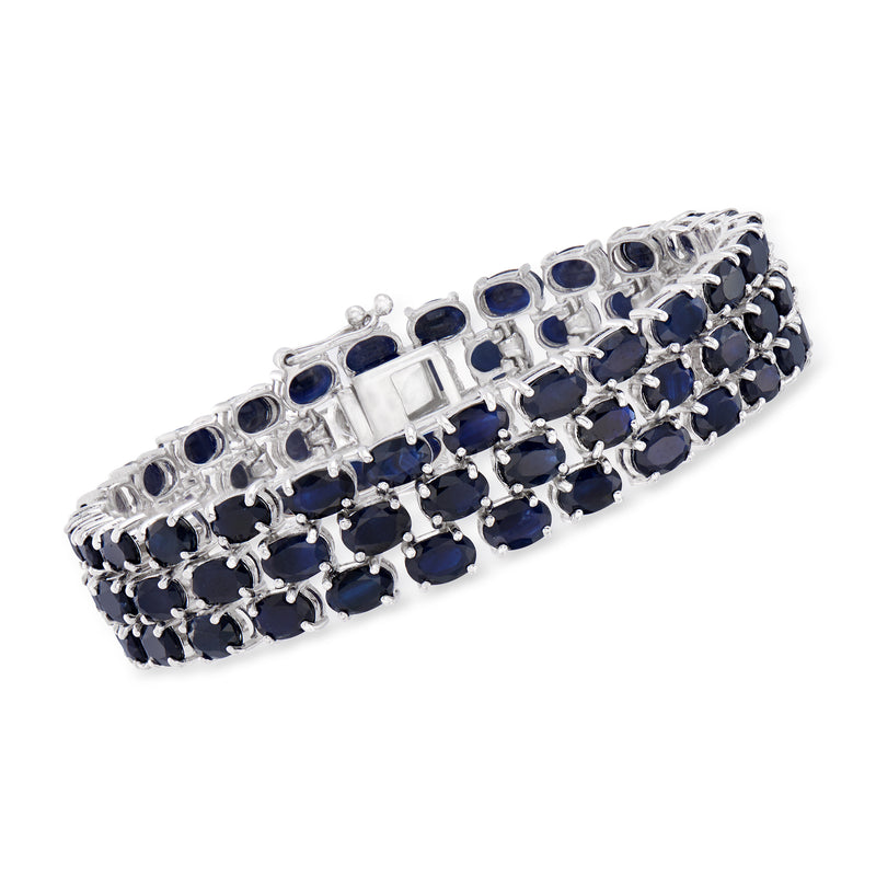 Sterling silver multi-row sapphire bracelet with oval deep-blue stones and hinged clasp