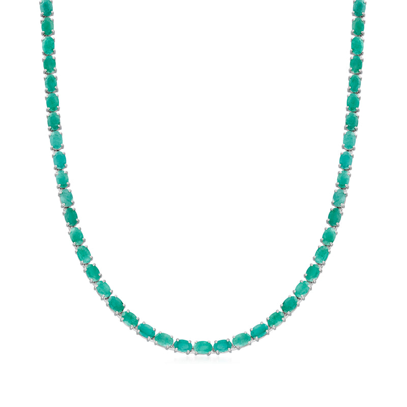 Sterling silver tennis necklace with oval green emerald stones in a line