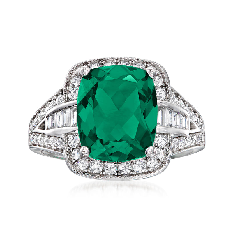 Sterling silver ring with large emerald-cut green simulated gemstone and CZ side baguettes