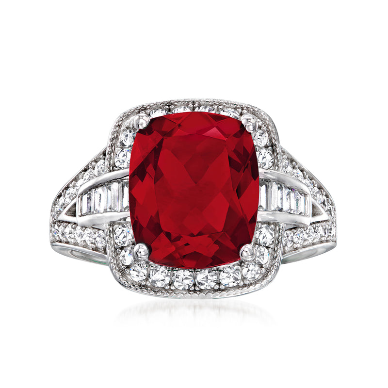 Sterling silver ring with large red cushion-cut simulated ruby and CZ side stones