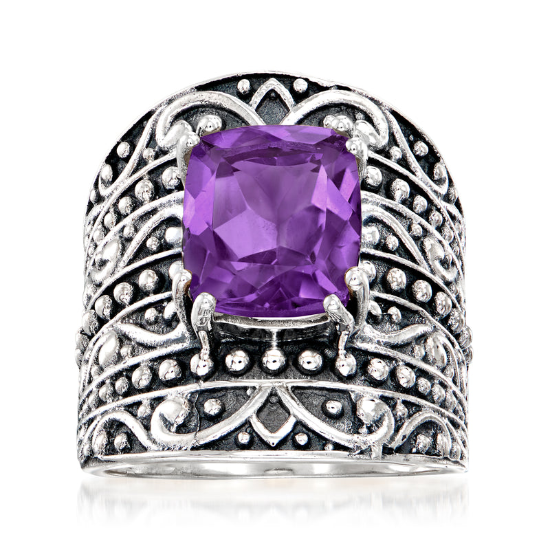 Sterling silver amethyst ring with purple square-cut stone and ornate scrollwork band
