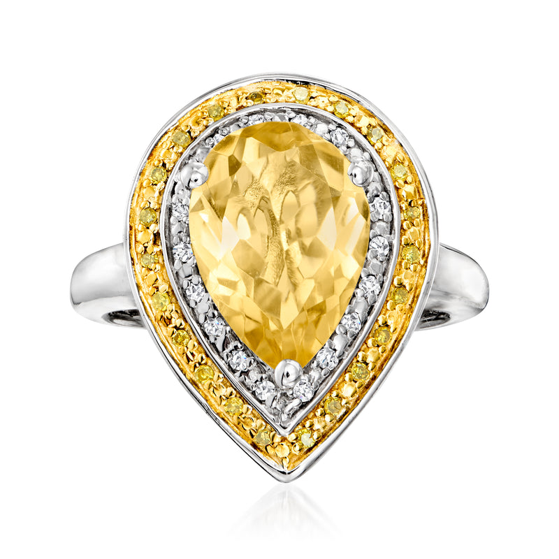 Pear-shaped citrine ring in sterling silver with diamond halo and yellow accent border