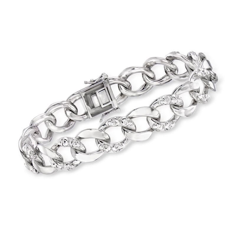 Sterling silver curb-link bracelet with skulls and rectangular center links