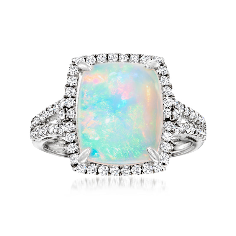 Opal center ring in 14kt white gold with halo of round diamonds