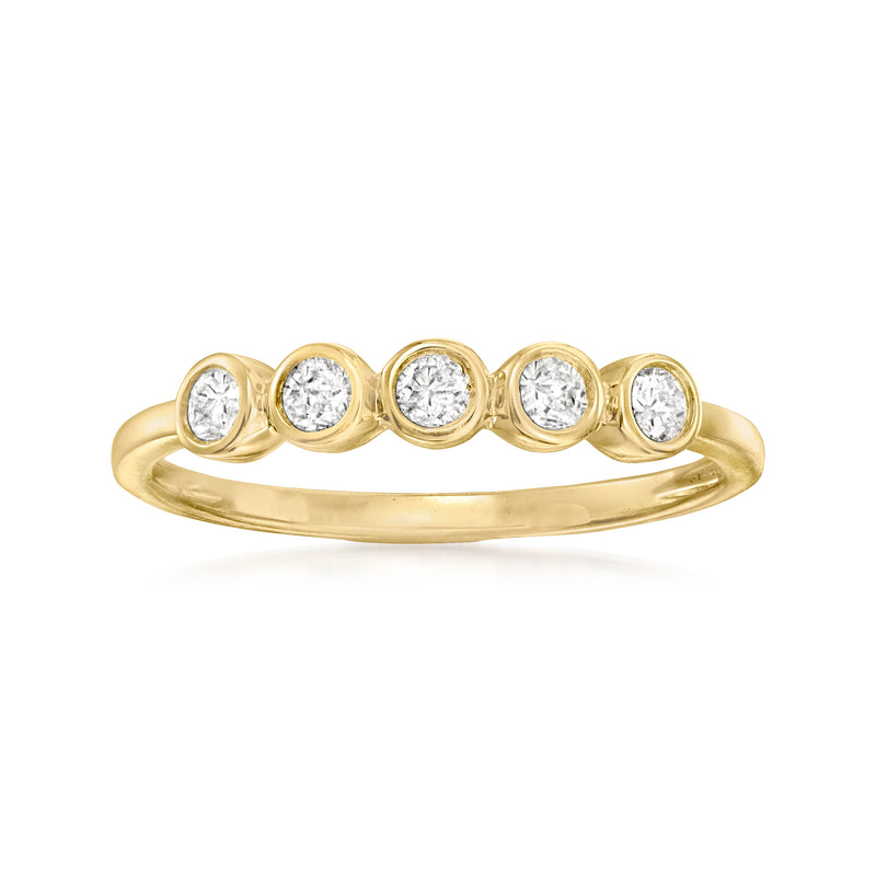 14kt yellow gold diamond ring with five round stones across the band