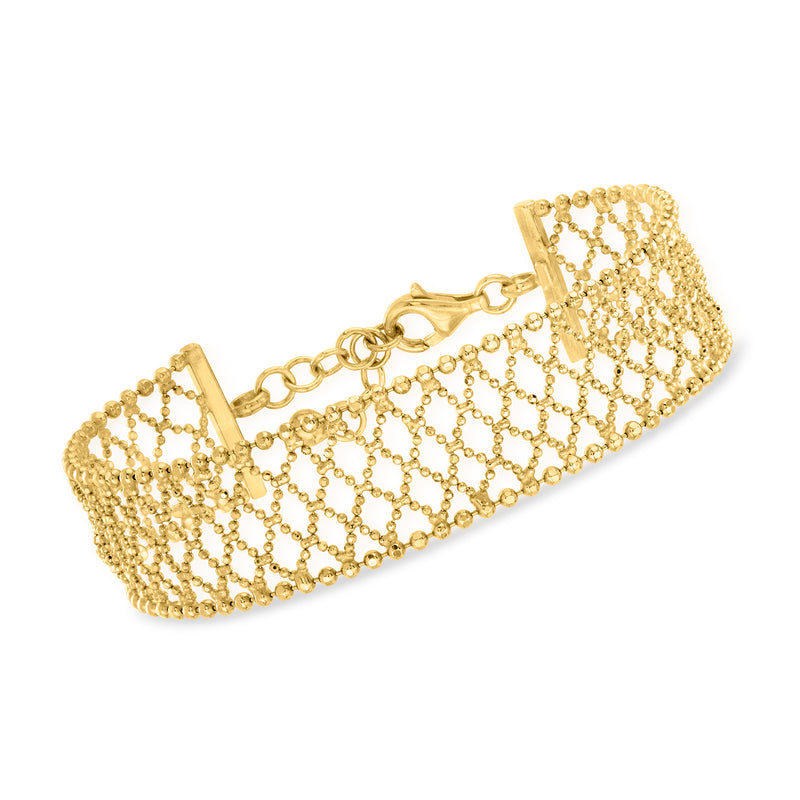 Gold-tone beaded mesh bracelet with toggle clasp and linked chain fringe.