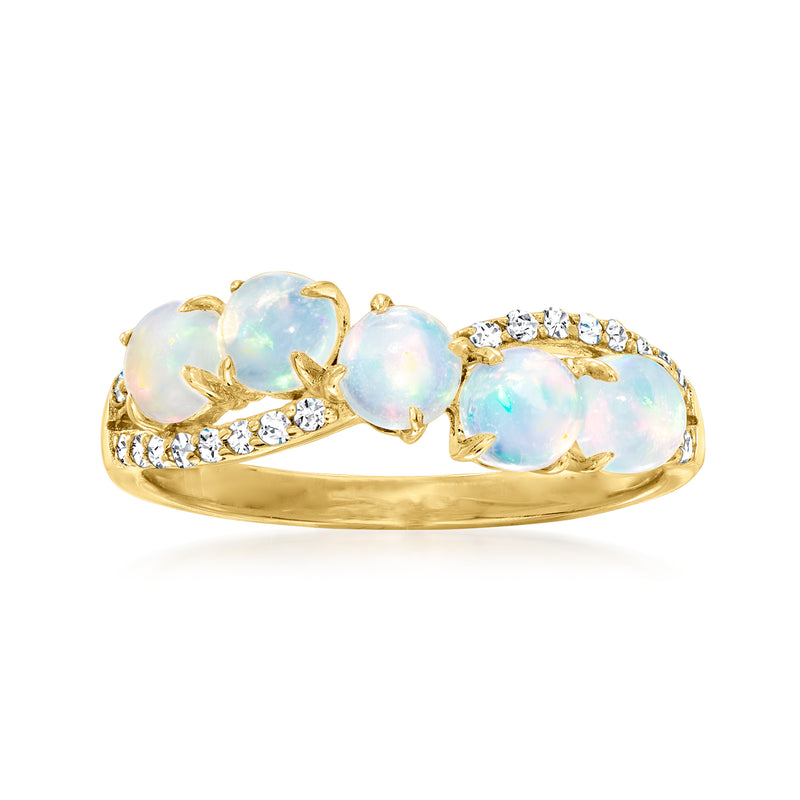 14kt yellow gold crisscross ring with three oval opal-like stones and diamond accents
