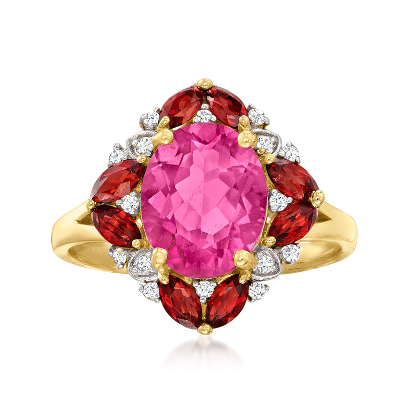 14kt yellow gold ring with pink topaz center, red gemstones sides, white diamond accents