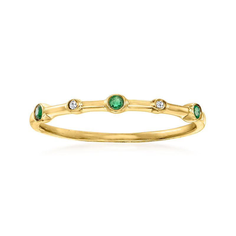 14kt yellow gold ring with green emerald center and small diamond accents, oval band
