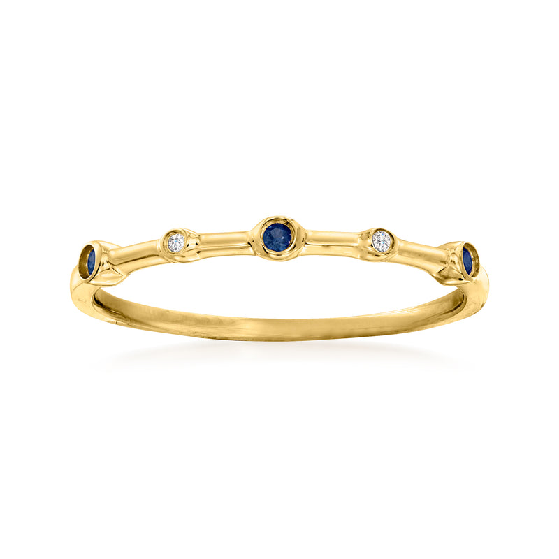 14kt yellow gold ring with oval blue sapphire and small diamond accents