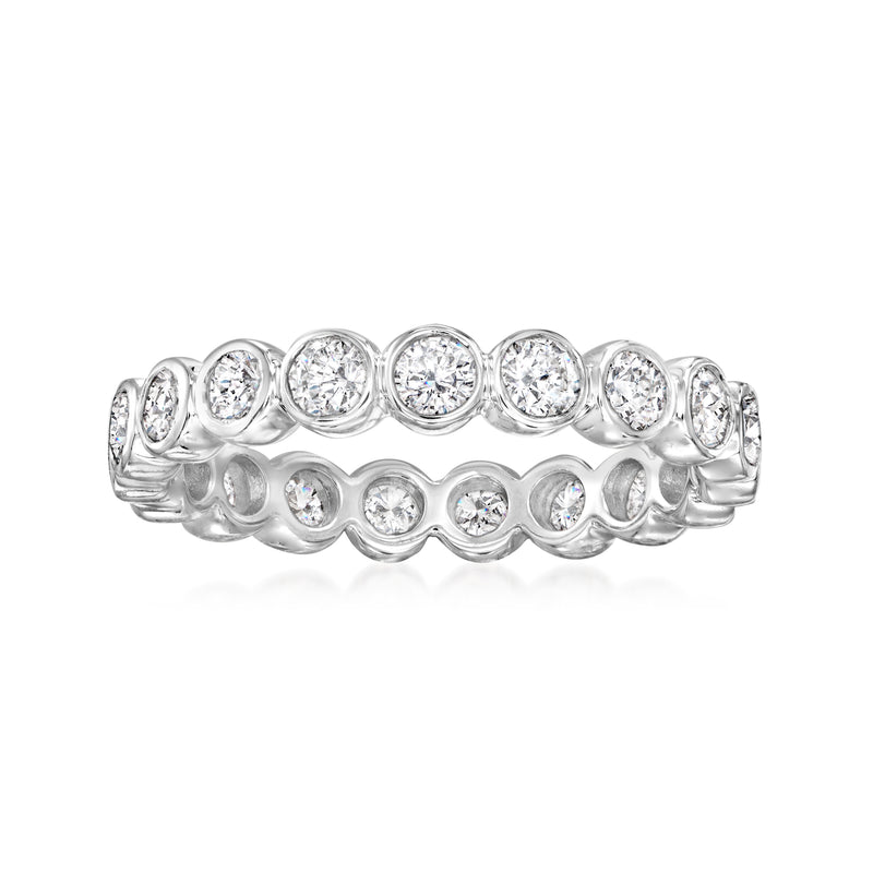 White gold diamond eternity band with bezel-set round stones