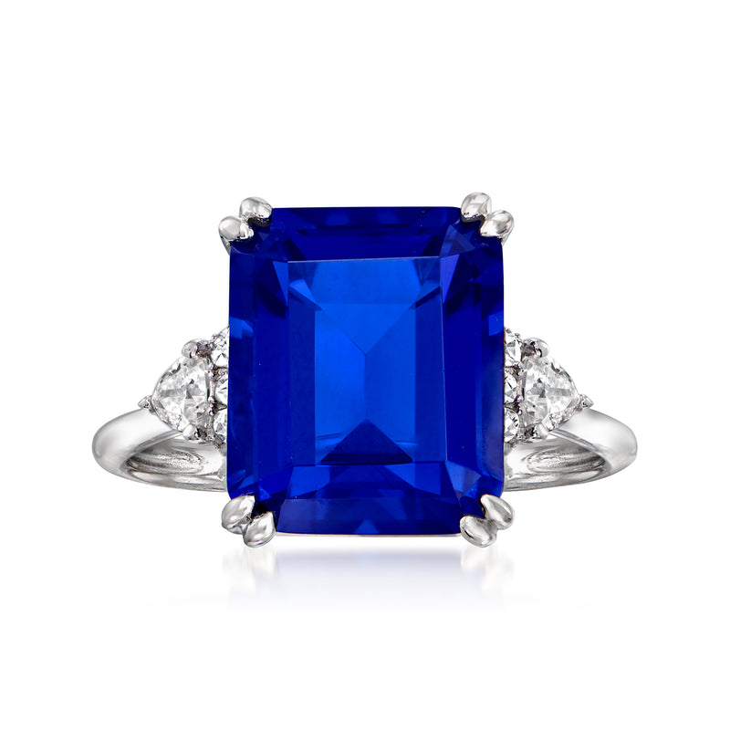 Sterling silver ring with large blue square center stone and CZ side accents