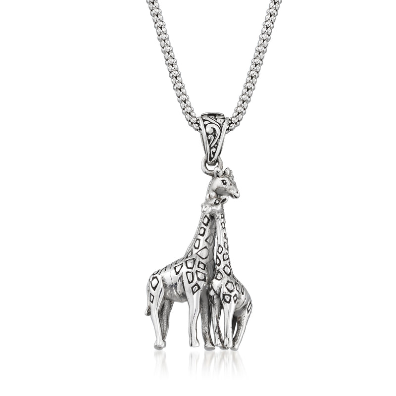 Sterling silver giraffe family pendant necklace with three dangling giraffes