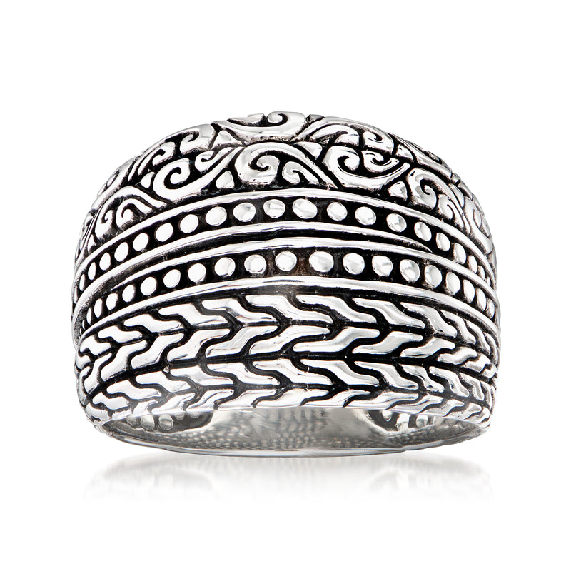 Sterling silver ring with Bali-style scrollwork and ridged geometric band