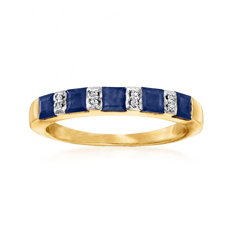 Sapphire and diamond ring in gold with dark blue square settings and stone accents