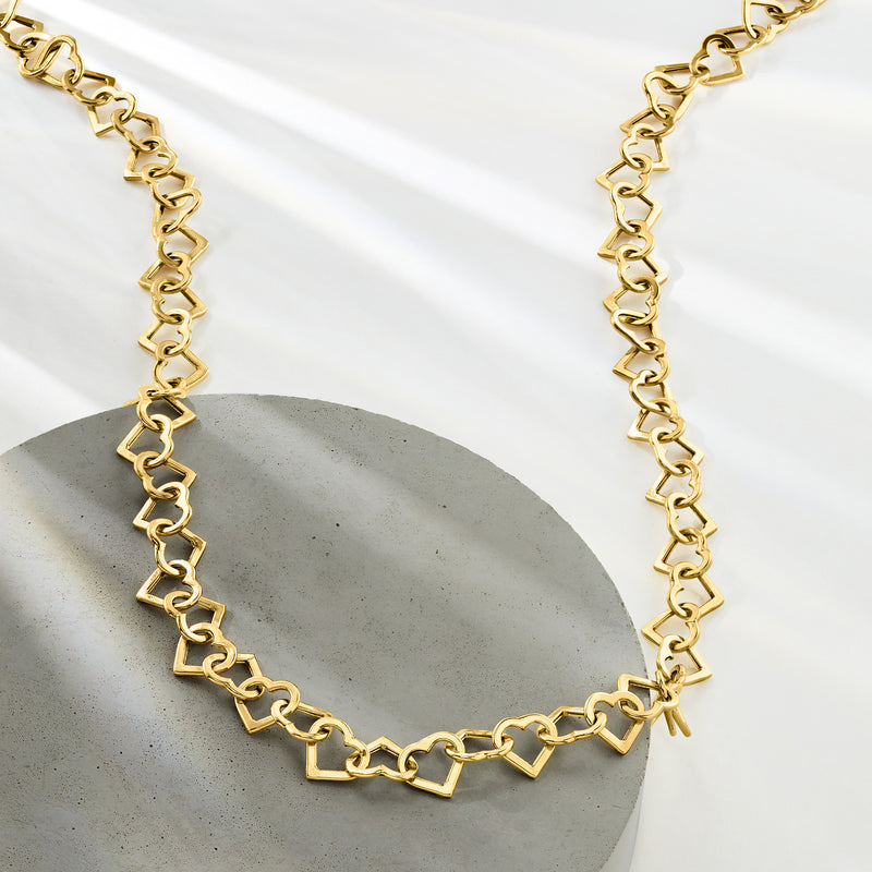 Yellow gold heart-link necklace with open-heart chain links