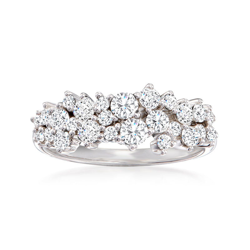 14kt white gold diamond cluster ring with round brilliant stones, prong-set.