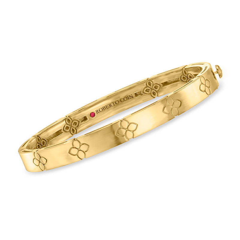 18kt yellow gold bangle bracelet with engraved flower and heart motifs