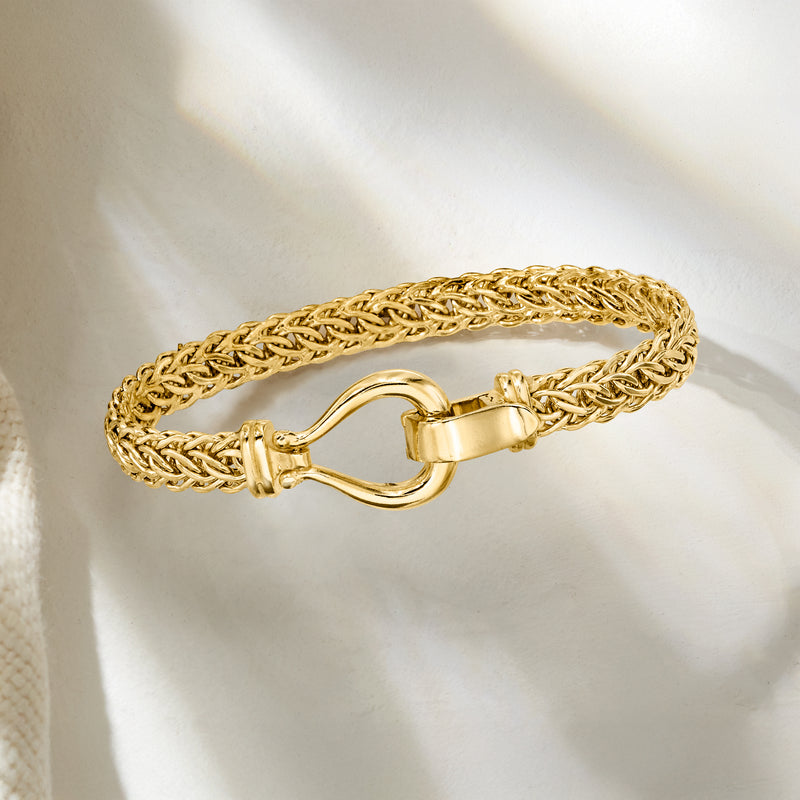 Gold over sterling Cestina-link bracelet with braided chain and heart-shaped clasp
