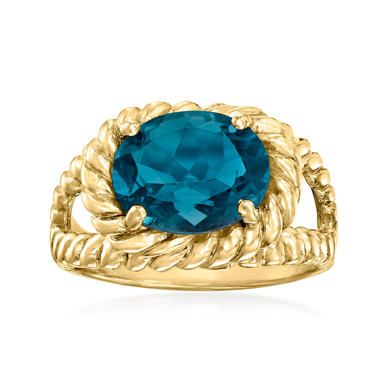 Gold rope band ring with large oval London blue topaz-style gemstone, bezel set