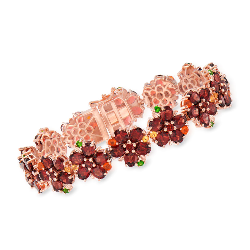 Rose gold over sterling gemstone flower bracelet with dark red clusters and green accents