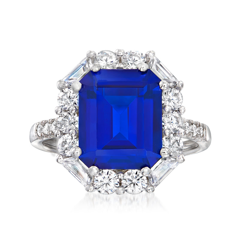 Sterling silver ring with large blue emerald-cut simulated sapphire and CZ halo