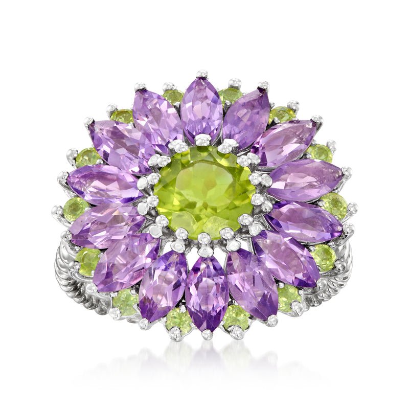 Sterling silver flower ring with amethyst petals, peridot center, and clear accents