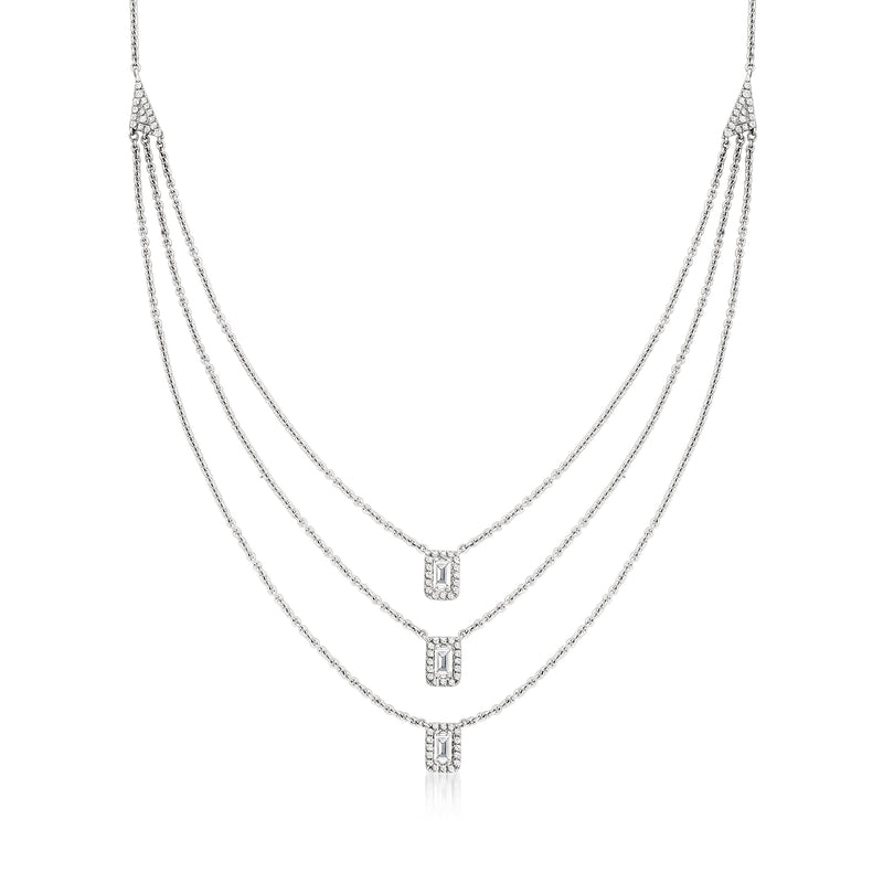 Three-strand diamond necklace in 18k white gold with three bezel-set links