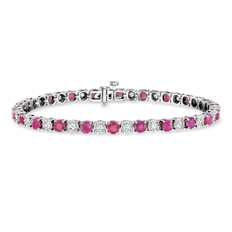 Sterling silver tennis bracelet with oval pink rubies and small round diamonds