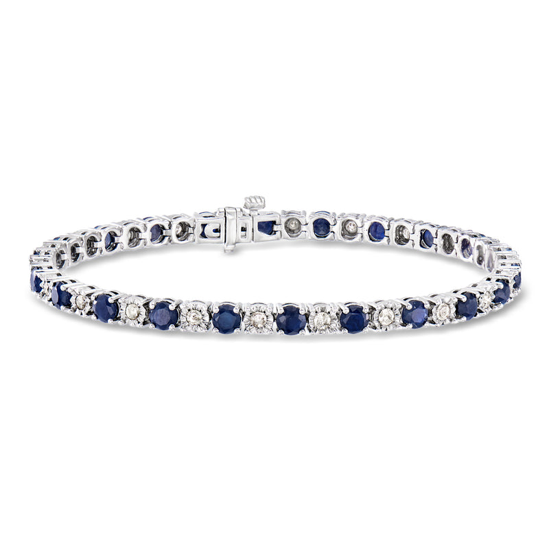 Sterling silver sapphire and diamond tennis bracelet with blue oval stones