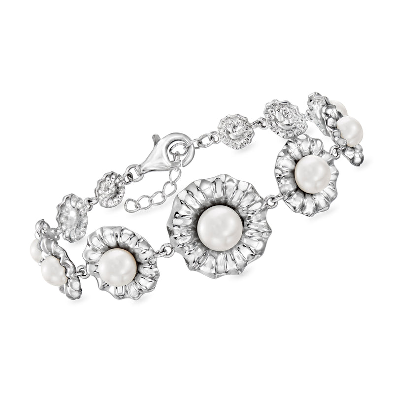 Sterling silver floral bracelet with white cultured pearl link charms