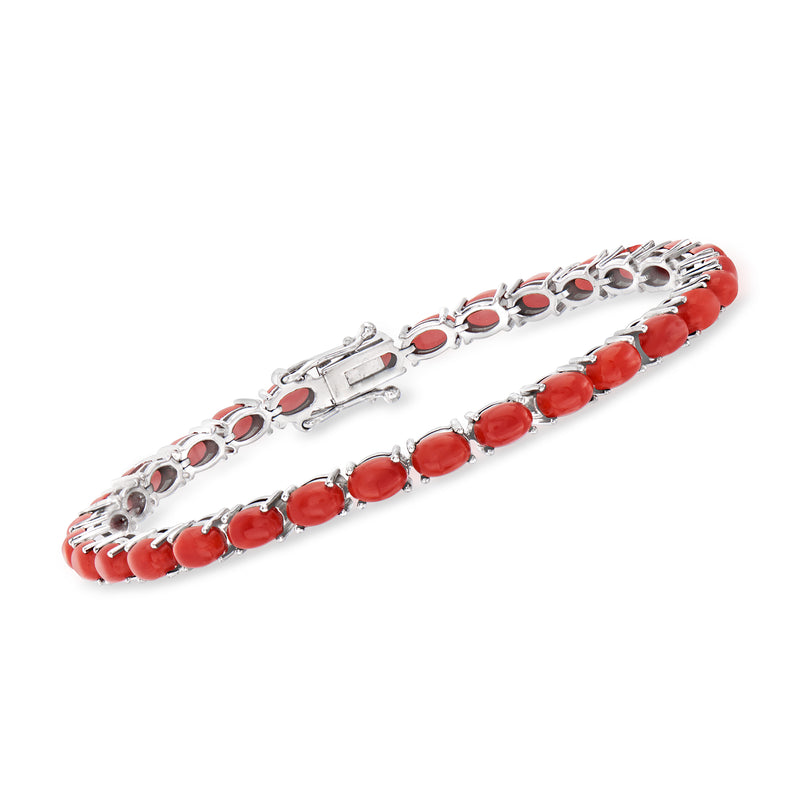 Sterling silver tennis bracelet with red coral oval beads and interlocking link settings