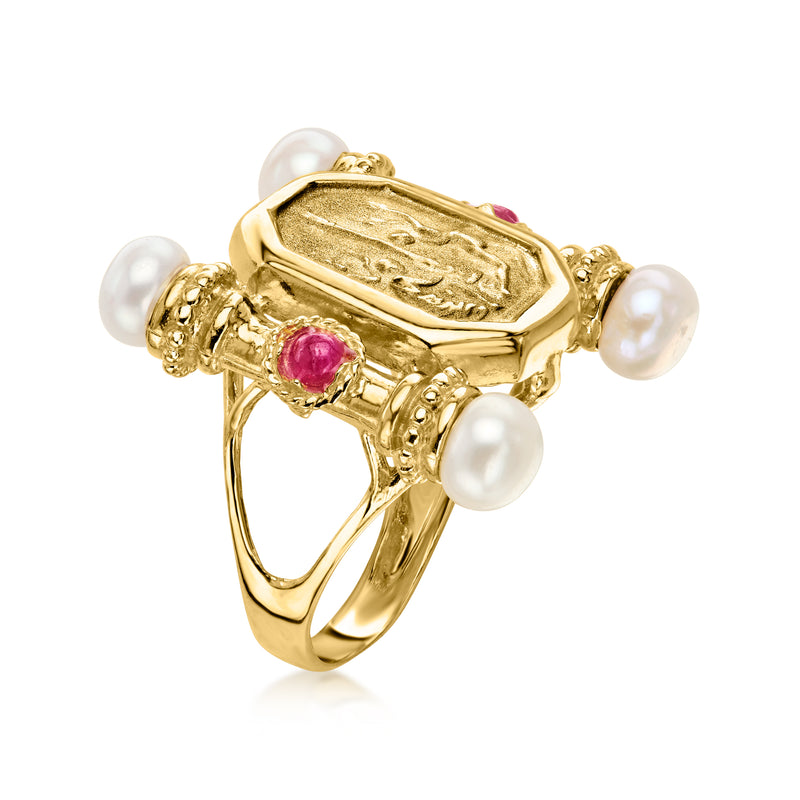 Gold-tone ring angled view with octagonal bezel, pink ruby stone, and white pearls