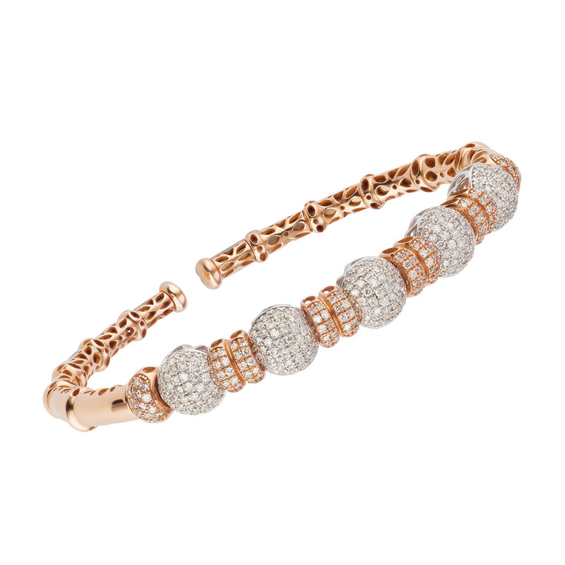 Two-tone gold diamond pave ball cuff bracelet with sparkling round stations