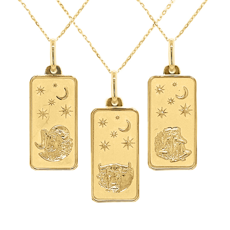 Yellow gold zodiac tag pendant necklace with three rectangular charms and star-and-animal motifs