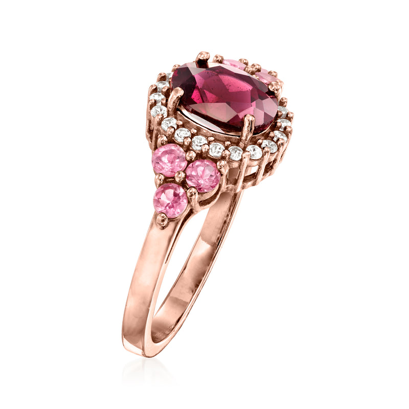 Rose gold oval center stone ring with pink clusters and white zircon border, side view.