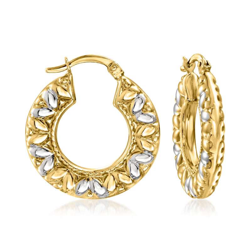 Two-tone gold oval-pattern hoop earrings with textured shield segments and polished edges