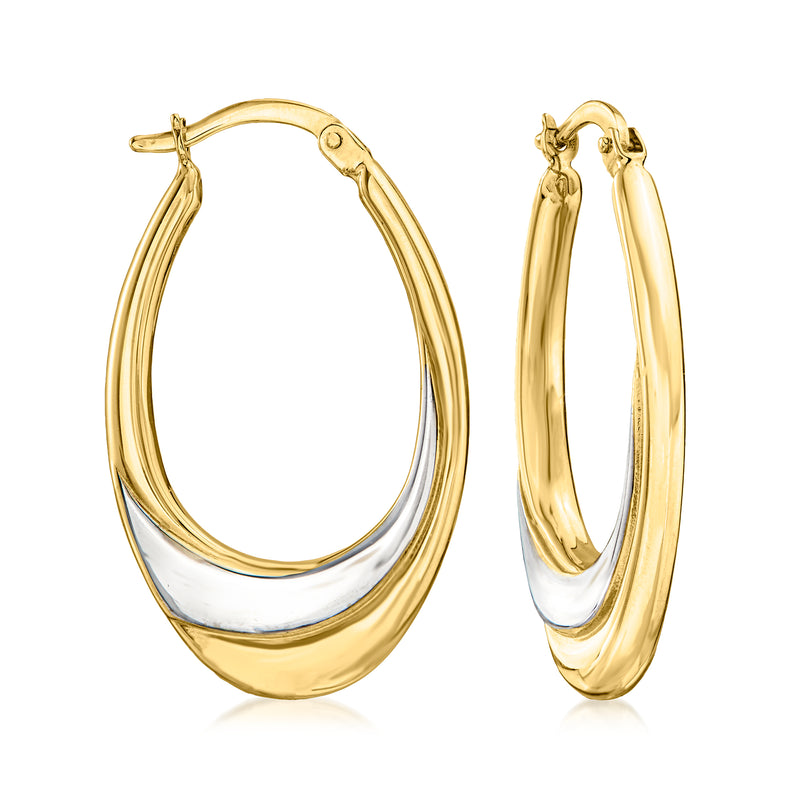 Two-tone 14k oval hoop earrings with smooth gold and silver-toned inner band