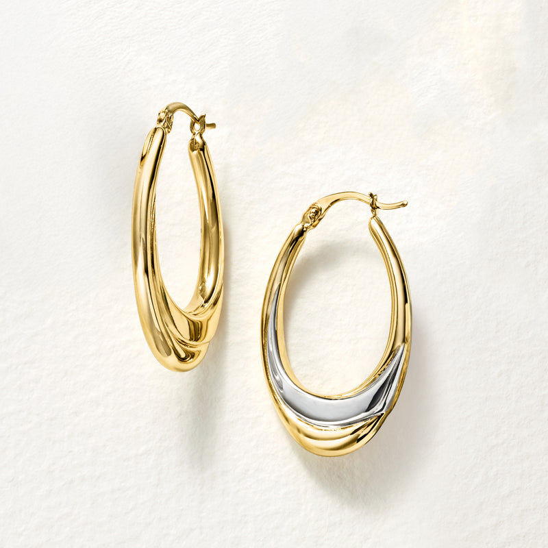 Two-tone oval hoop earrings, gold outer with silver-toned curved inset