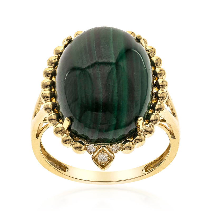 Oval malachite cabochon ring in 14kt yellow gold with diamond accents on scalloped band