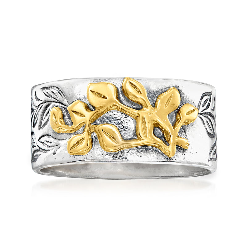 Sterling silver ring with raised 14kt yellow gold leaf design on a wide band