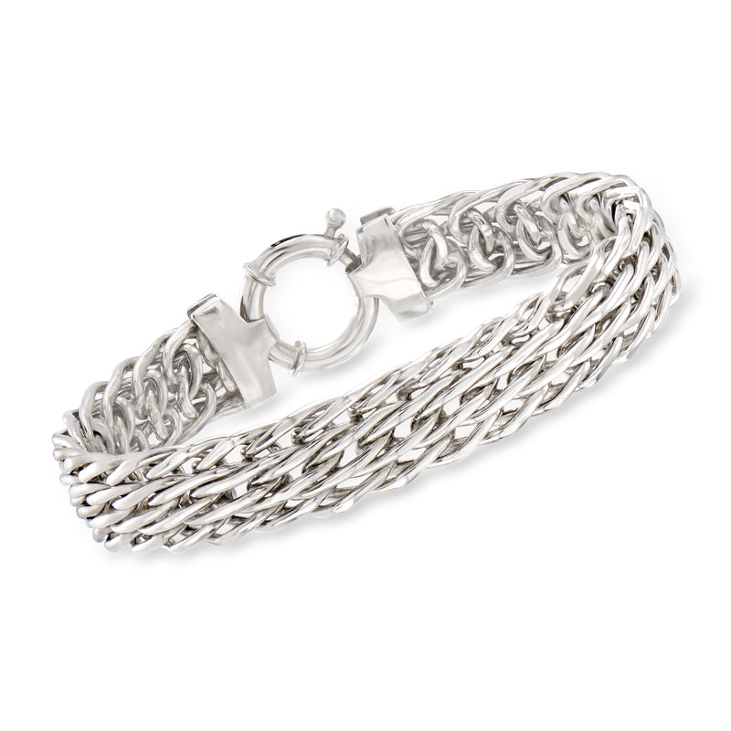 Sterling silver bracelet with twisted chain links and hinged clasp, polished finish