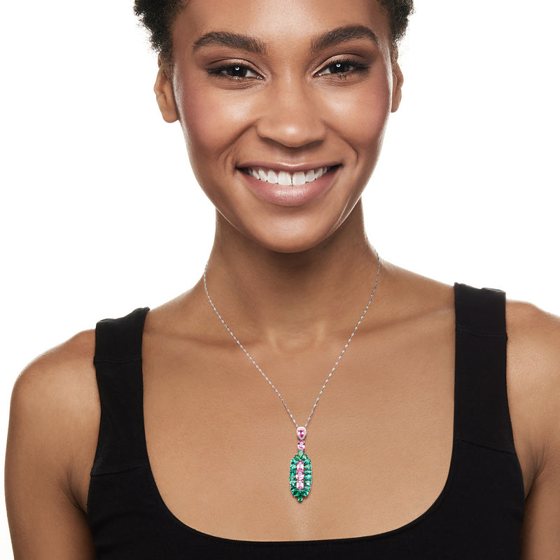 Gemstone pendant necklace with pink and green stones on a delicate chain