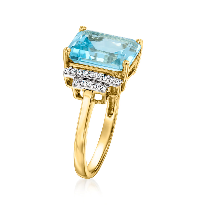 14kt yellow gold ring featuring a sky blue topaz with diamond band accents