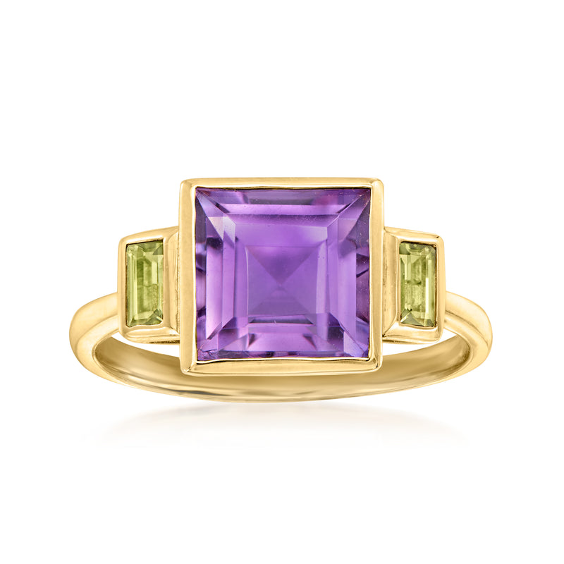 14kt yellow gold ring with square amethyst center and two green peridot side stones