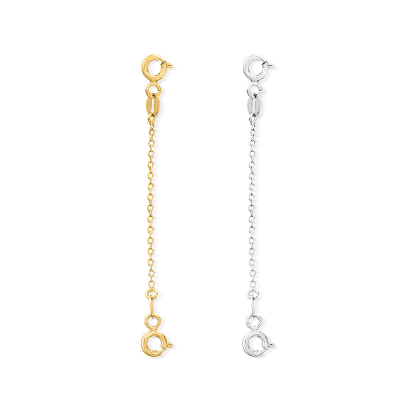 Two safety chains in gold and silver with circular loop clasps