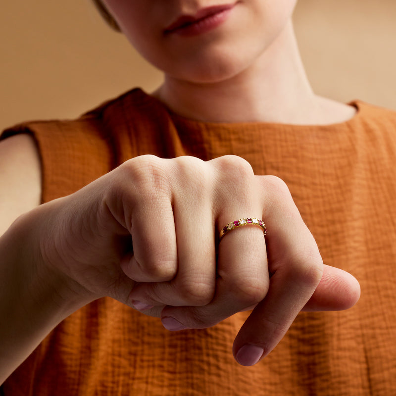 Ruby and diamond rectangular-stone ring on hand, slim 14kt yellow gold band