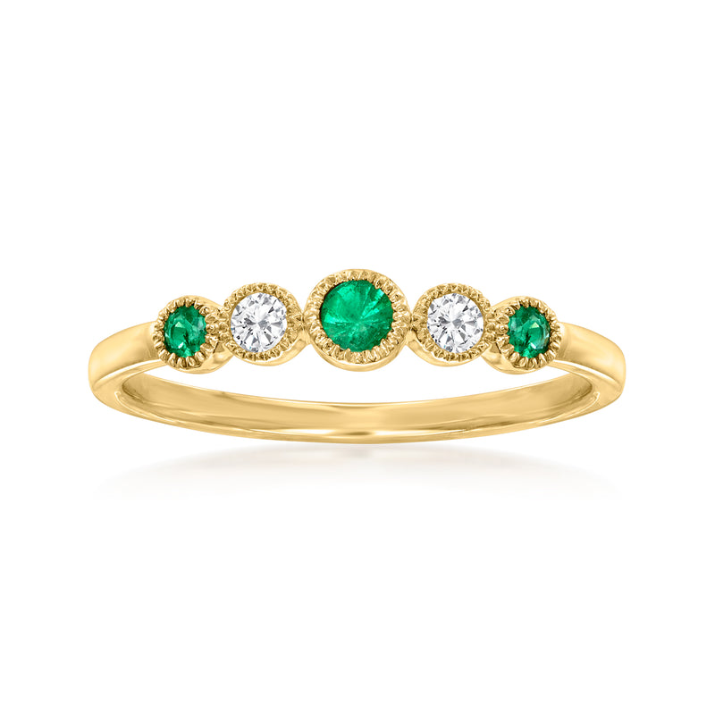 14kt yellow gold ring with three green emeralds and two round white diamonds