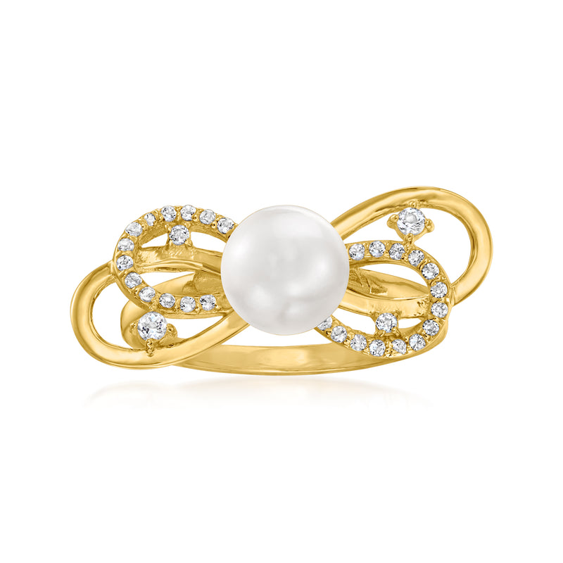 18kt gold bow ring with white pearl center and clear crystal accents